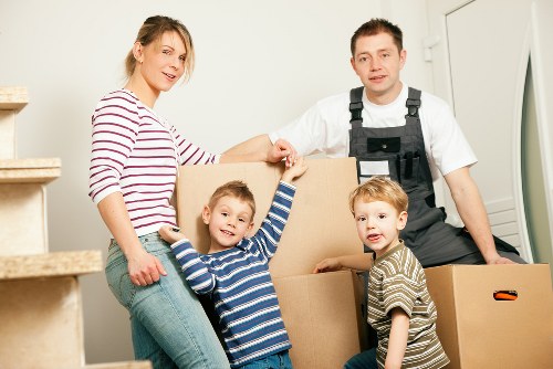 Local movers handling sofas and boxes during a Richmonduponthames relocation