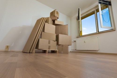 Man with a van loading furniture in Richmond upon Thames
