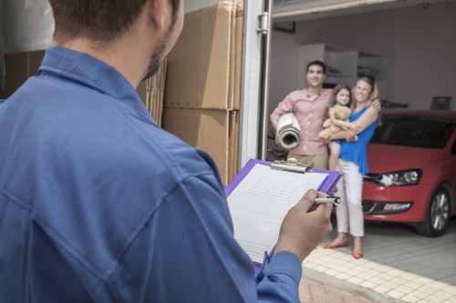 Furniture pick-up service removing a sofa in Richmond upon Thames