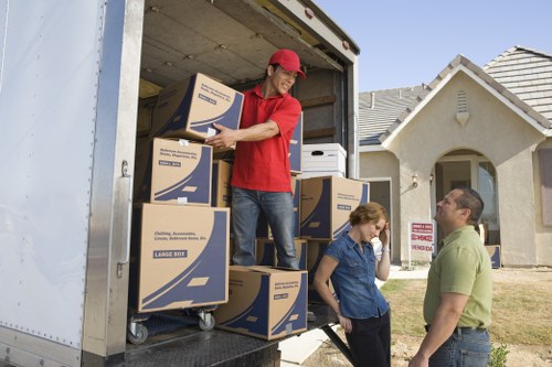 Professional man with a van assisting with a home move in Richmond upon Thames