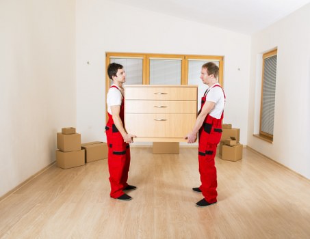 Local moving team packing fragile household items in Richmond Upon Thames